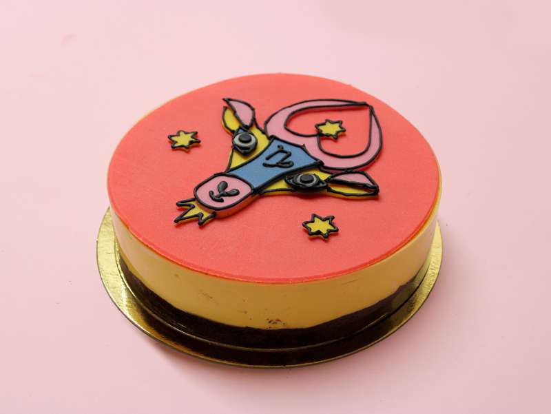 Gâteau d'anniversaire Astro Capricorne avec un dessin de l'artiste française Virgen. À commander et personnaliser.