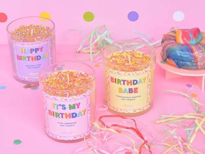 Cadeau d'anniversaire, collection de bougies "happy birthday" en cire naturelle, de couleur pastel avec des confettis.