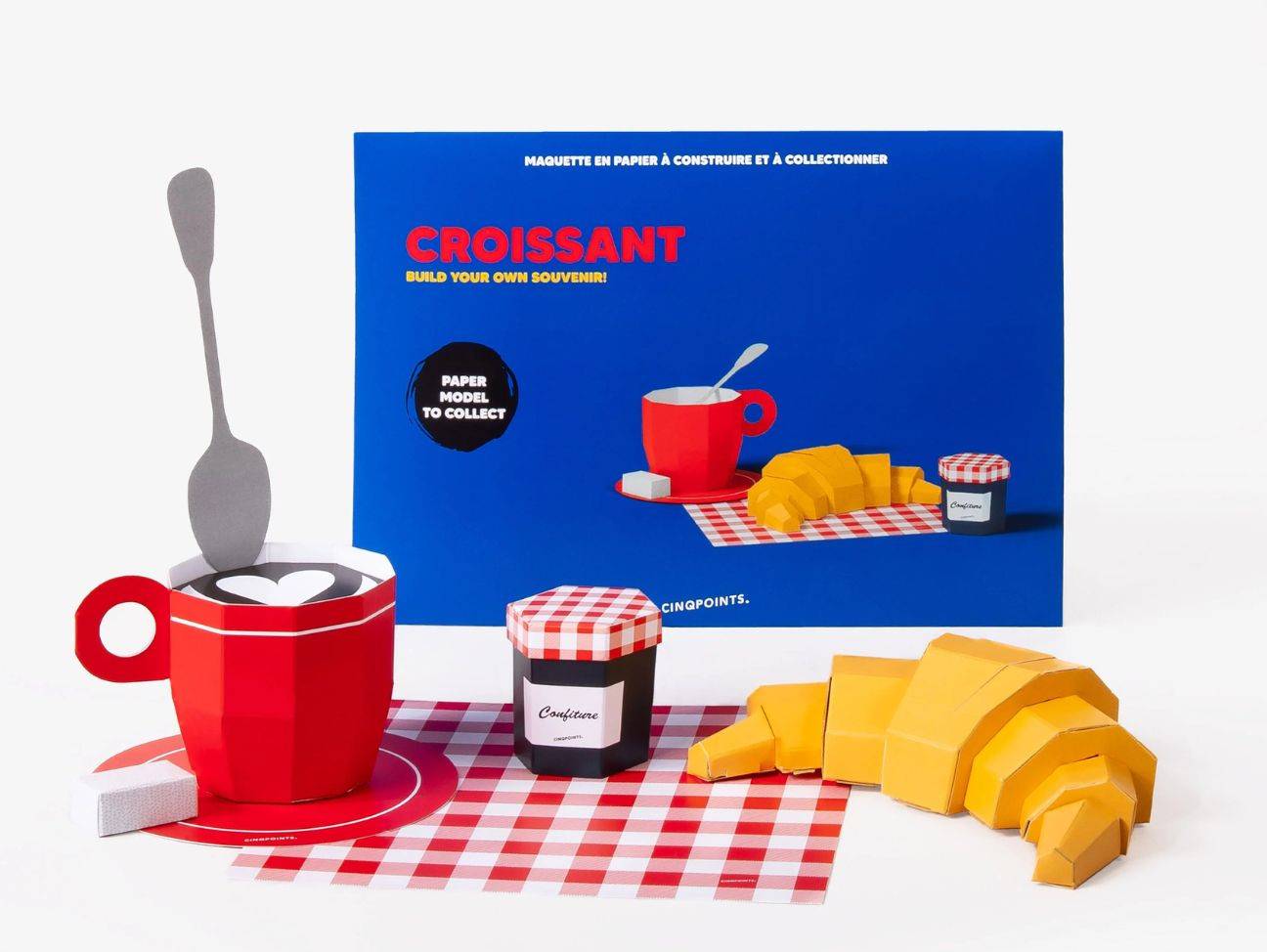 Maquette en papier 3D à assembler soi-même, représentant un croissant, tasse de café, sucre, serviette, petit pot de confiture
