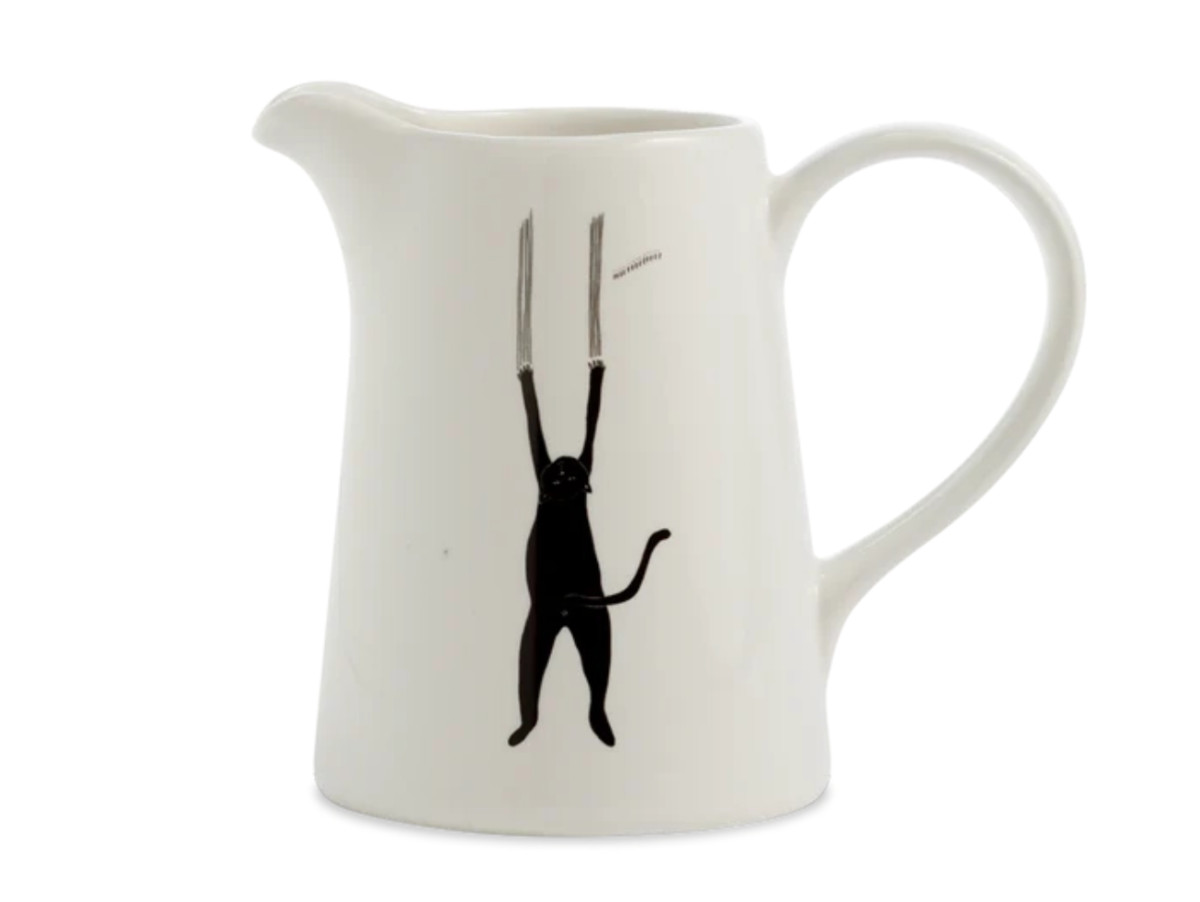 pot à lait en porcelaine blanc avec dessin noir d'un chat
